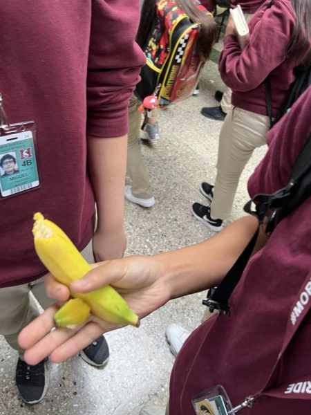 Morton East student eating banana