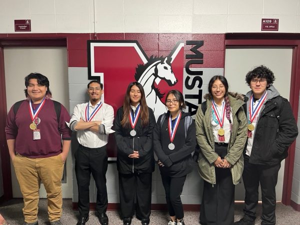Miguel Martinez, Bryant Michel, Kathaline Villavicencio, Sam Rangel, Bianca Nicolas, and Sebastian Cruz taking a picture after they got back from the competition.
