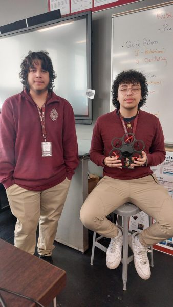 Engineer Students Carlos Coronel and Diego Miramontes hold their model drone.