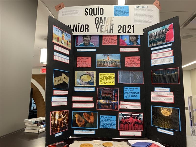 GAME ON…Squid Game is a show that was super popular junior year.  The Netflix series revolved around a secret contest when 456 players, all struggling with finances, risk their lives to play a series of deadly children’s games for a chance to win $45.6 billion.  “I’m not sure a billion dollars is worth risking one’s life,” said English teacher Mr. Kent Frankfother.
