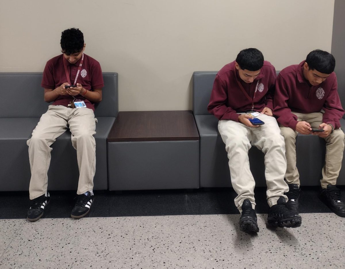 Josue Cervantes, Martin Aguirre, and Alexis Lobato on their phones without permission.