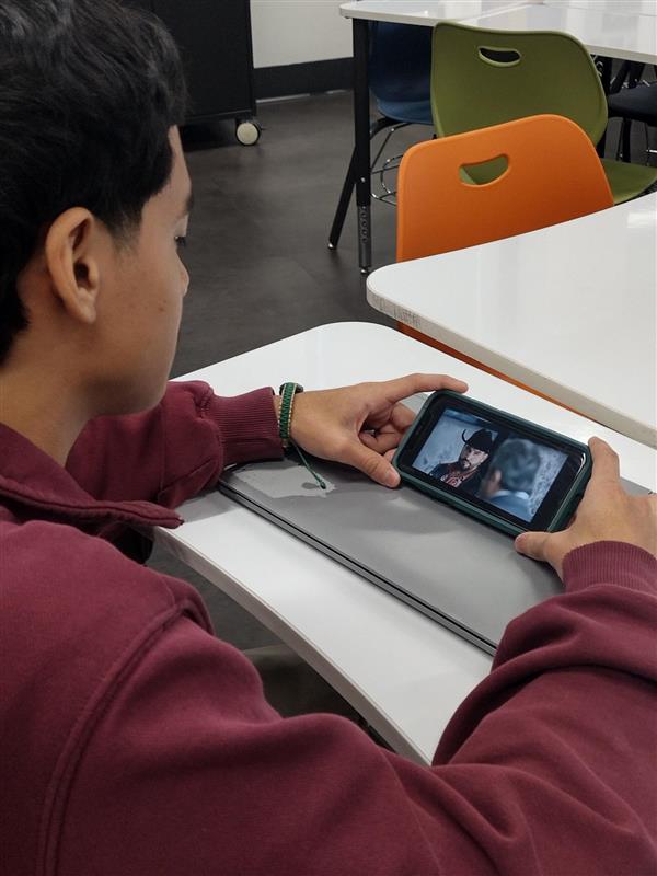 Senior Josue Cervantes Morales catches up on an episode of  "El Señor de los Cielos".