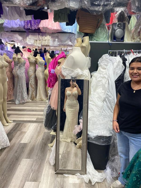 START SHOPPING FOR PROM NOW!  Senior Rosa Lopez shops for that perfect prom dress.  