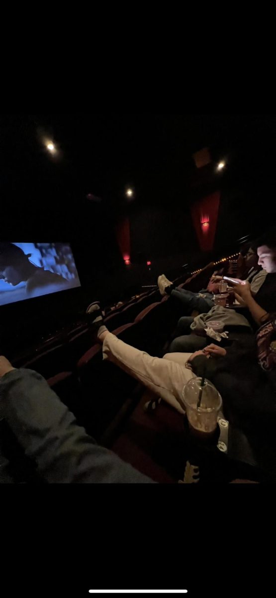 Jovani Romero, Breanna Lopez , Alexander Romero , and Leslie Romero watch a movie at Riverside.