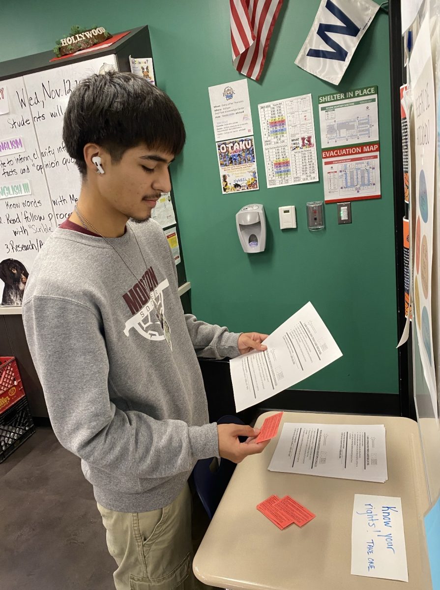 Sergio Barragan looking at the resources provided by teachers.