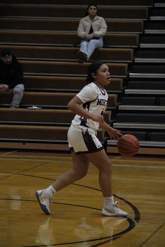 This is Morton East's very own Leah Brown playing for the varsity girls basketball team. 