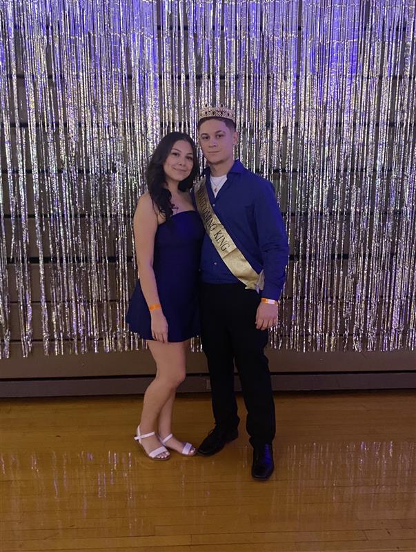 Homecoming King Francisco Saez reigns over homecoming with his girlfriend.  