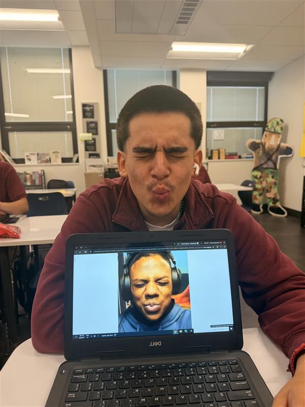 Senior Adrian Gutierrez reacting to funny Ishowspeed videos.