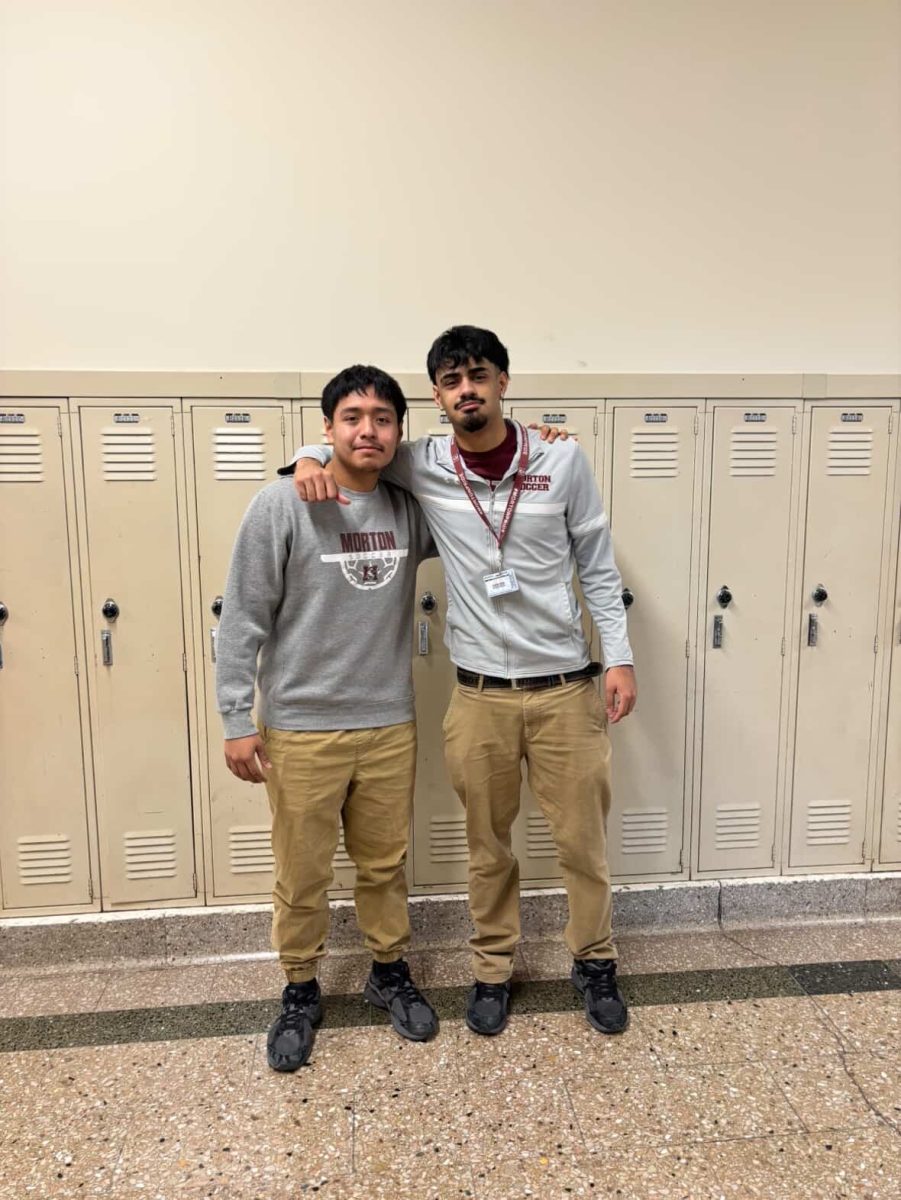 Friends Alexander Barrera and Nicolas Zaragoza expressing their love for each other.
