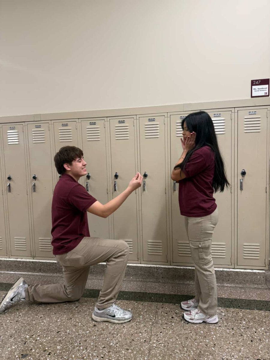 Student Sebastian Saenz 'proposes' to Sandra Gallegos.