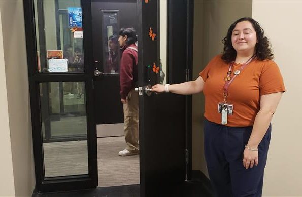 Ms. Salgado is shown greeting students inside to receive help.