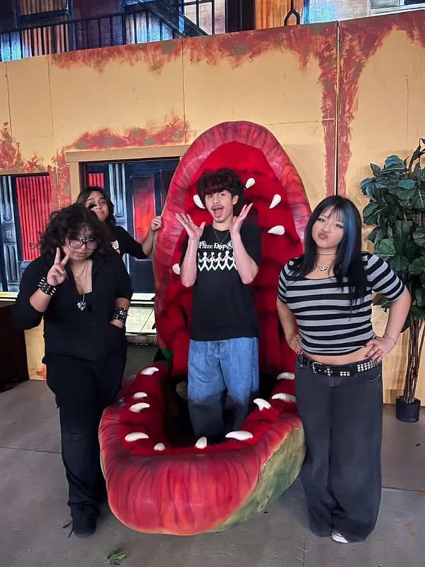 Junior Janet Pineda (right) mastered the controls of the man-eating plant in Little Shop of Horrors.  Trixie Puentes, Alan Rodriguez, and Pedro Martinez assisted.  
