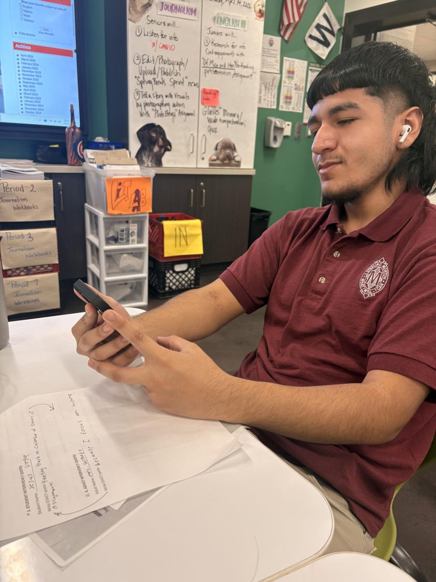 Senior Adolfo Medina Monroy doom scrolls instead of doing work.